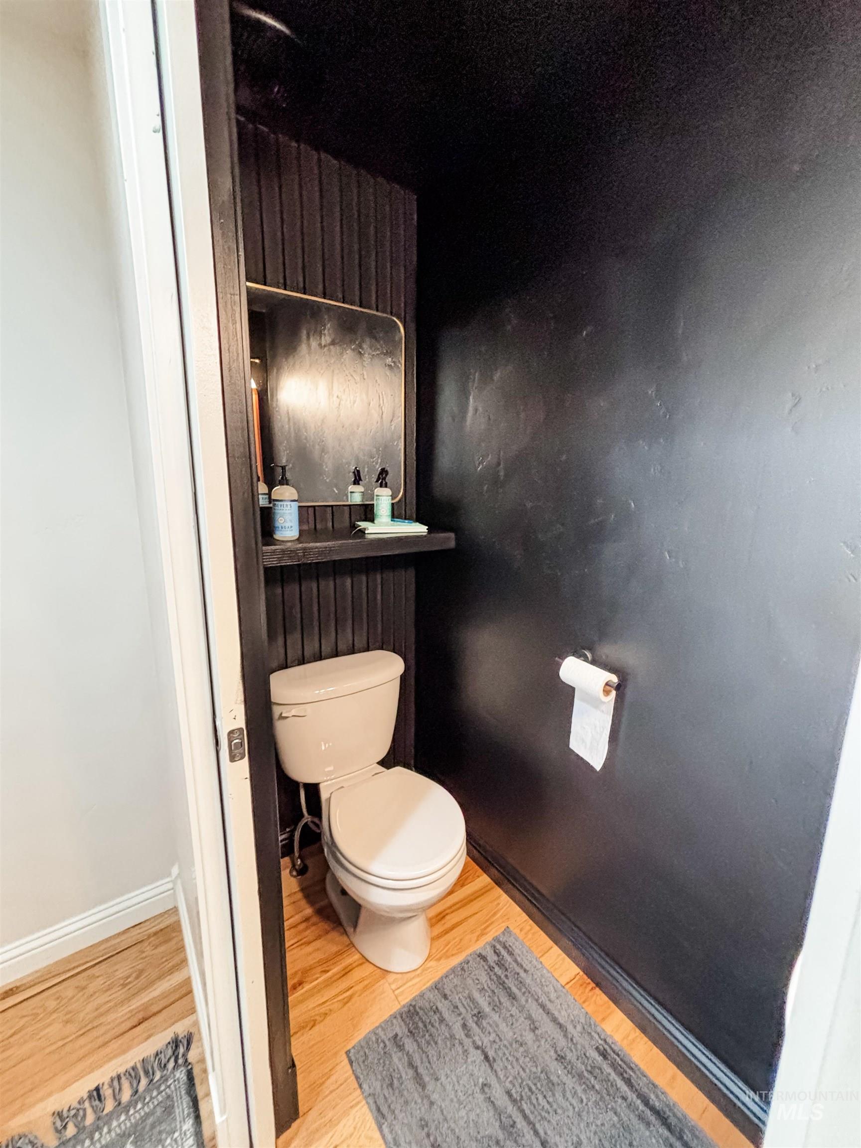 743 North Horseshoe Bend Road Eagle, ID 83616 - Photo 23 of 27 Bathroom featuring toilet and light wood-type flooring