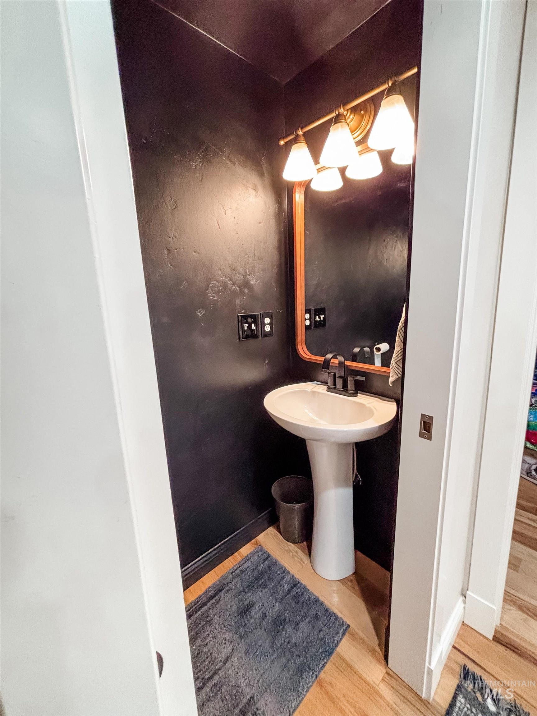743 North Horseshoe Bend Road Eagle, ID 83616 - Photo 24 of 27 Bathroom with light wood-type flooring and baseboards
