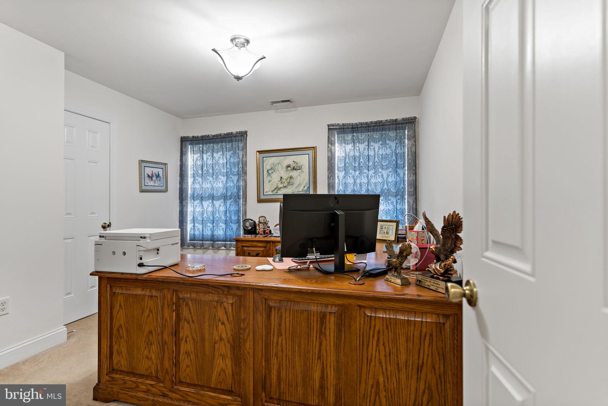 33 Caesar Road Harpers Ferry, WV 25425 - Photo 25 of 47 a room with a couch and a flat screen tv