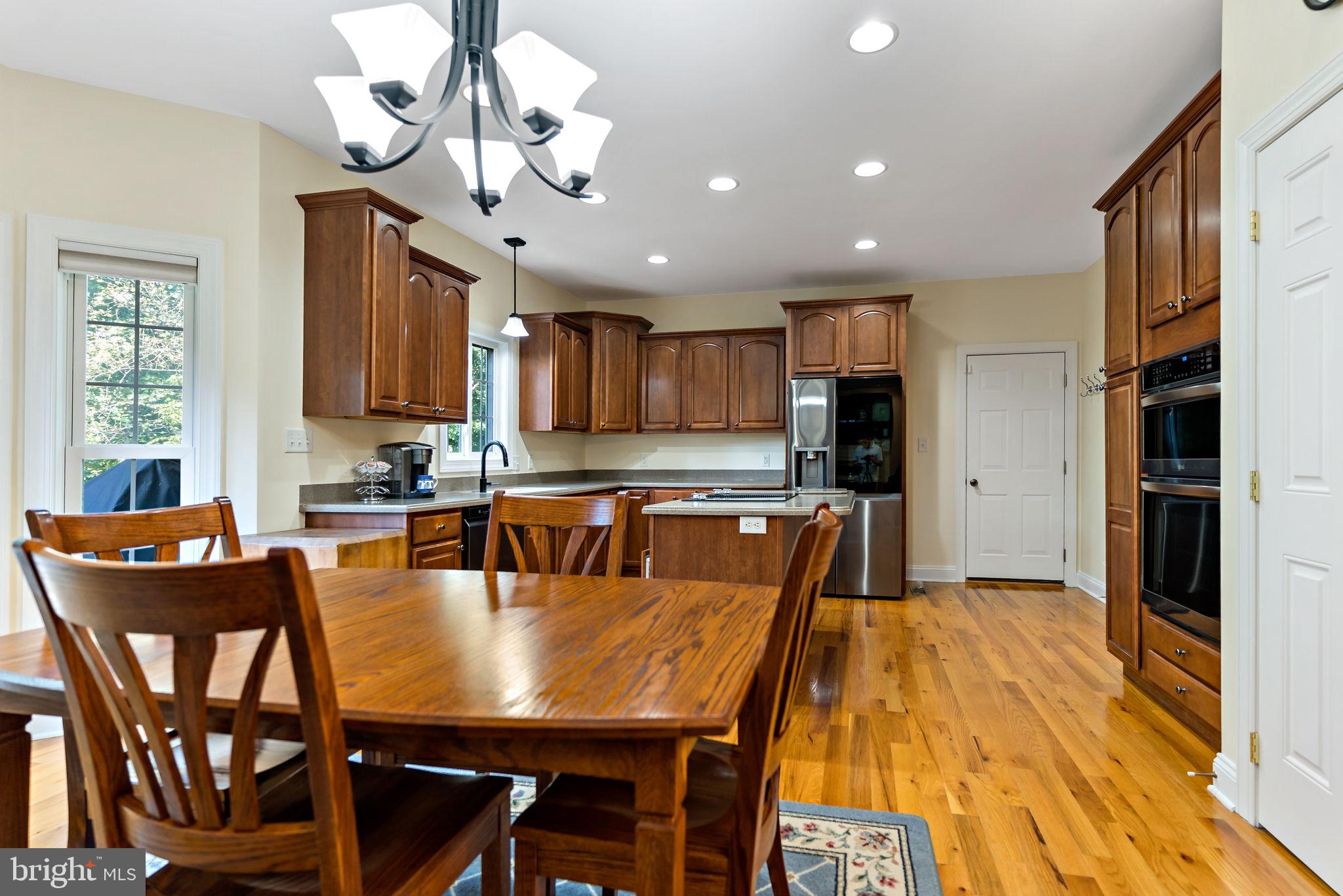 33 Caesar Road Harpers Ferry, WV 25425 - Photo 6 of 47 a view of a dining room with furniture and a chandelier