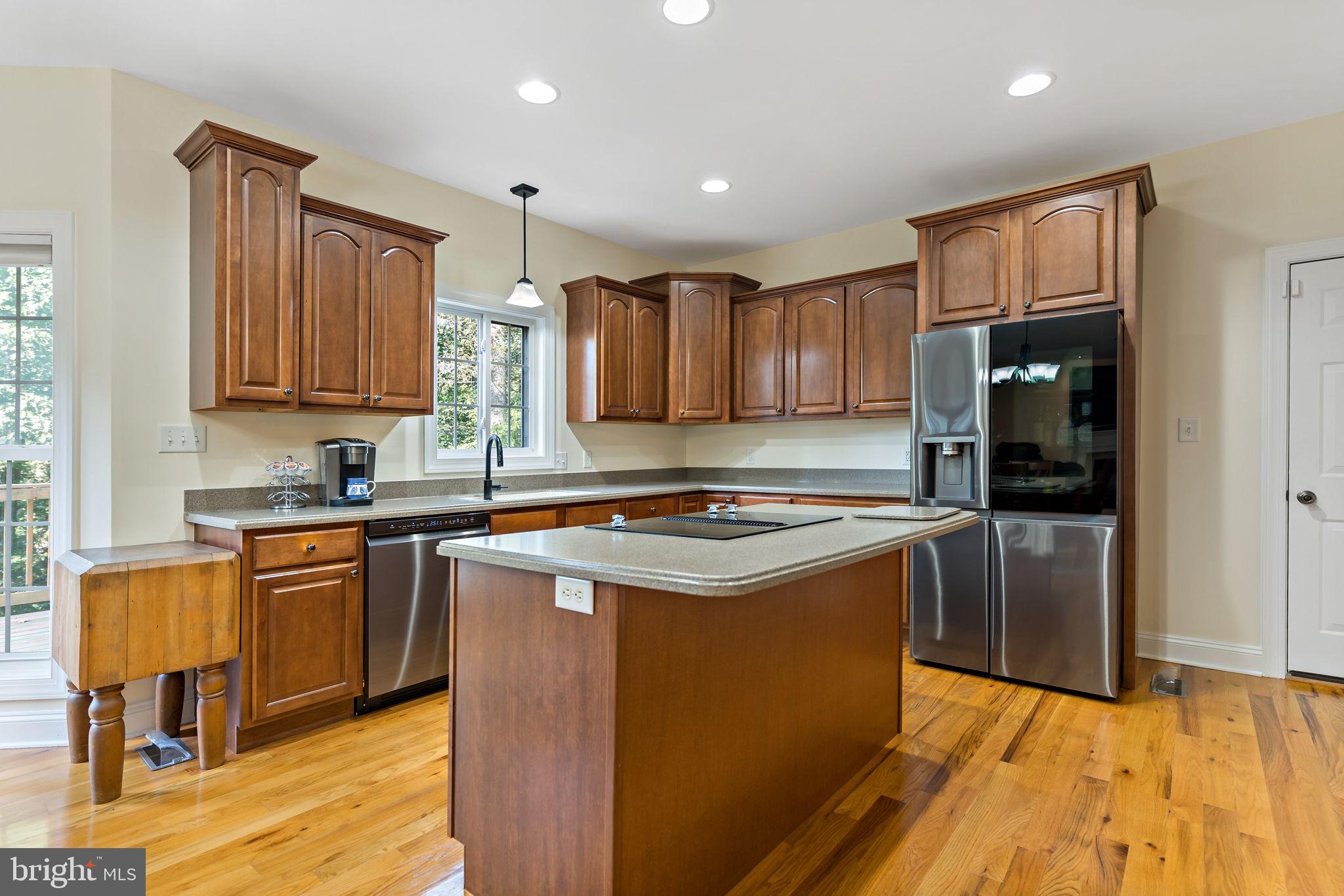33 Caesar Road Harpers Ferry, WV 25425 - Photo 9 of 47 a kitchen with stainless steel appliances granite countertop a stove refrigerator sink and cabinets