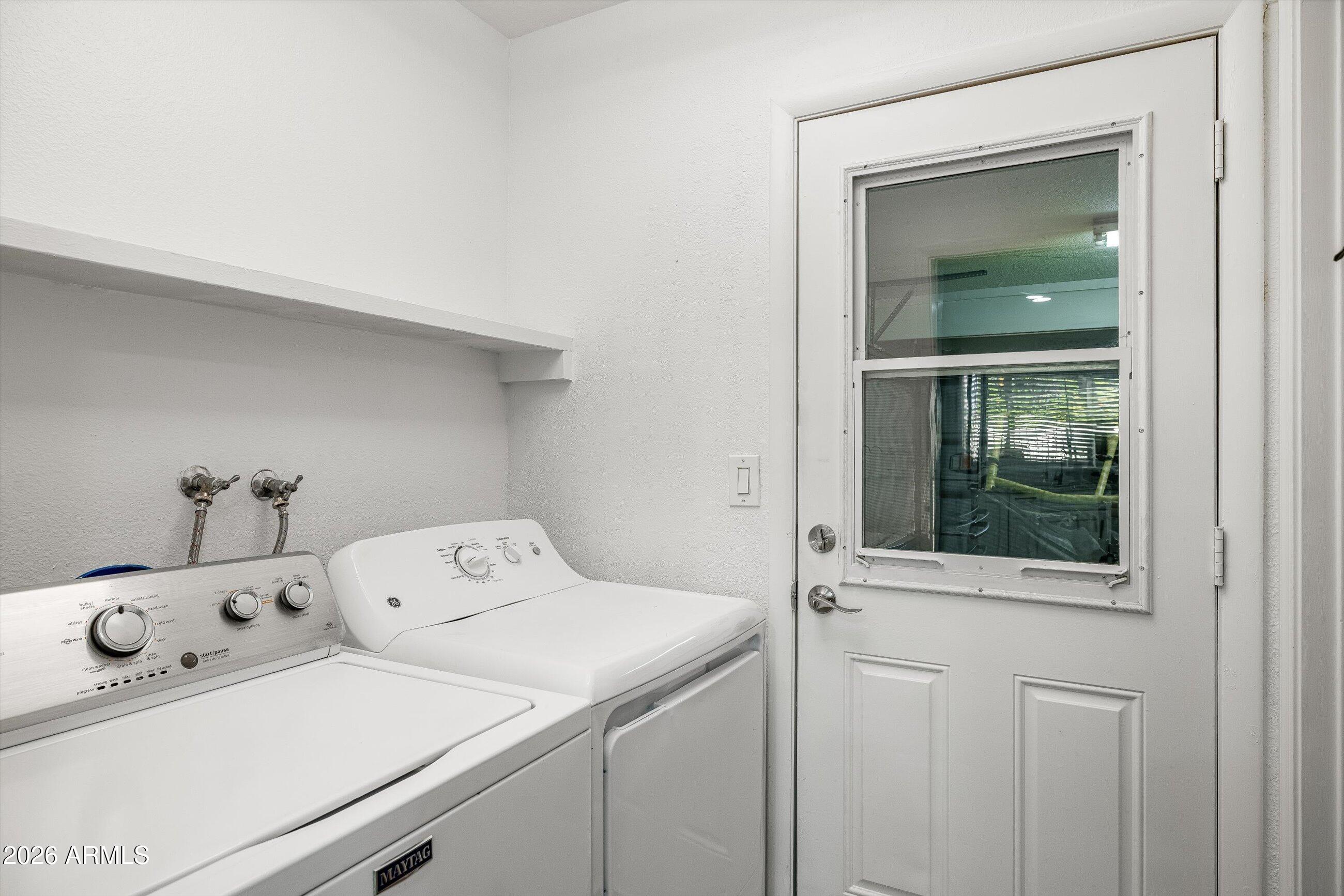 3024 West Wagoner Road Phoenix, AZ 85053 - Photo 18 of 34 a utility room with dryer and washer
