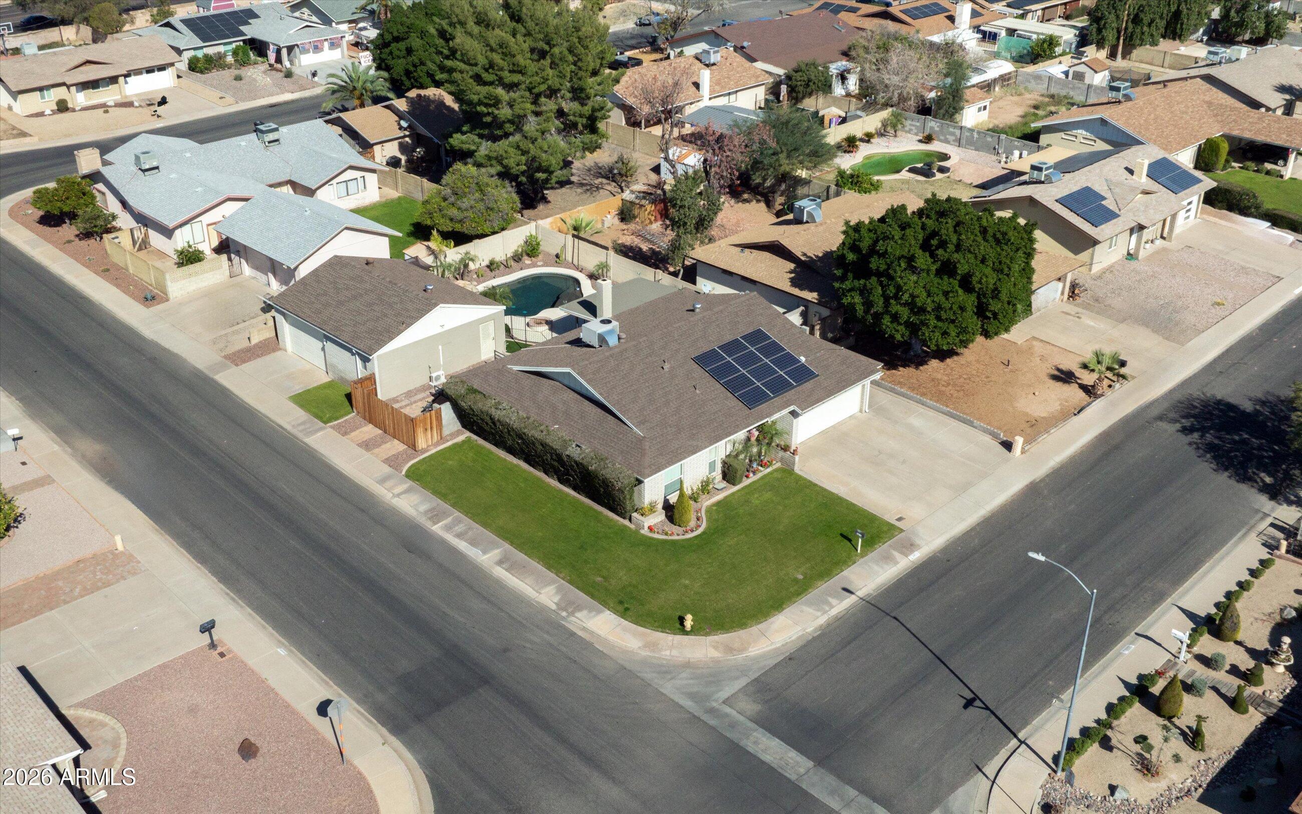 3024 West Wagoner Road Phoenix, AZ 85053 - Photo 28 of 34 an aerial view of a house with a garden