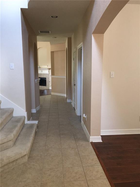 5720 Pebble Ridge Drive McKinney, TX 75070 - Photo 3 of 24 Formal dining with laminated floor!