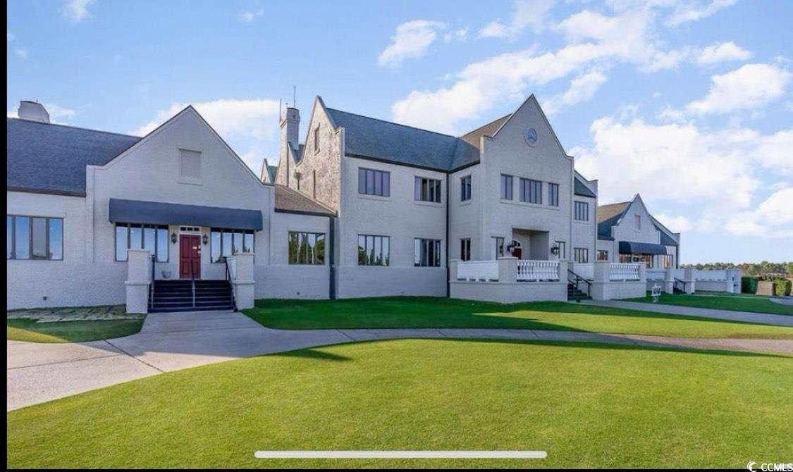 4603 Arran Court, Unit C Myrtle Beach, SC 29579 - Photo 23 of 34 View of front facade featuring a front yard