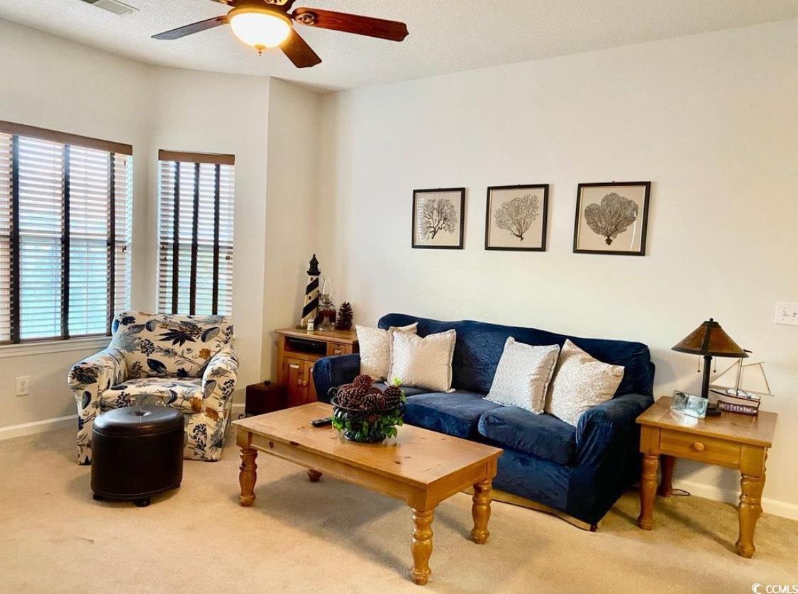 4603 Arran Court, Unit C Myrtle Beach, SC 29579 - Photo 3 of 34 Living room featuring carpet flooring, a ceiling fan, and baseboards