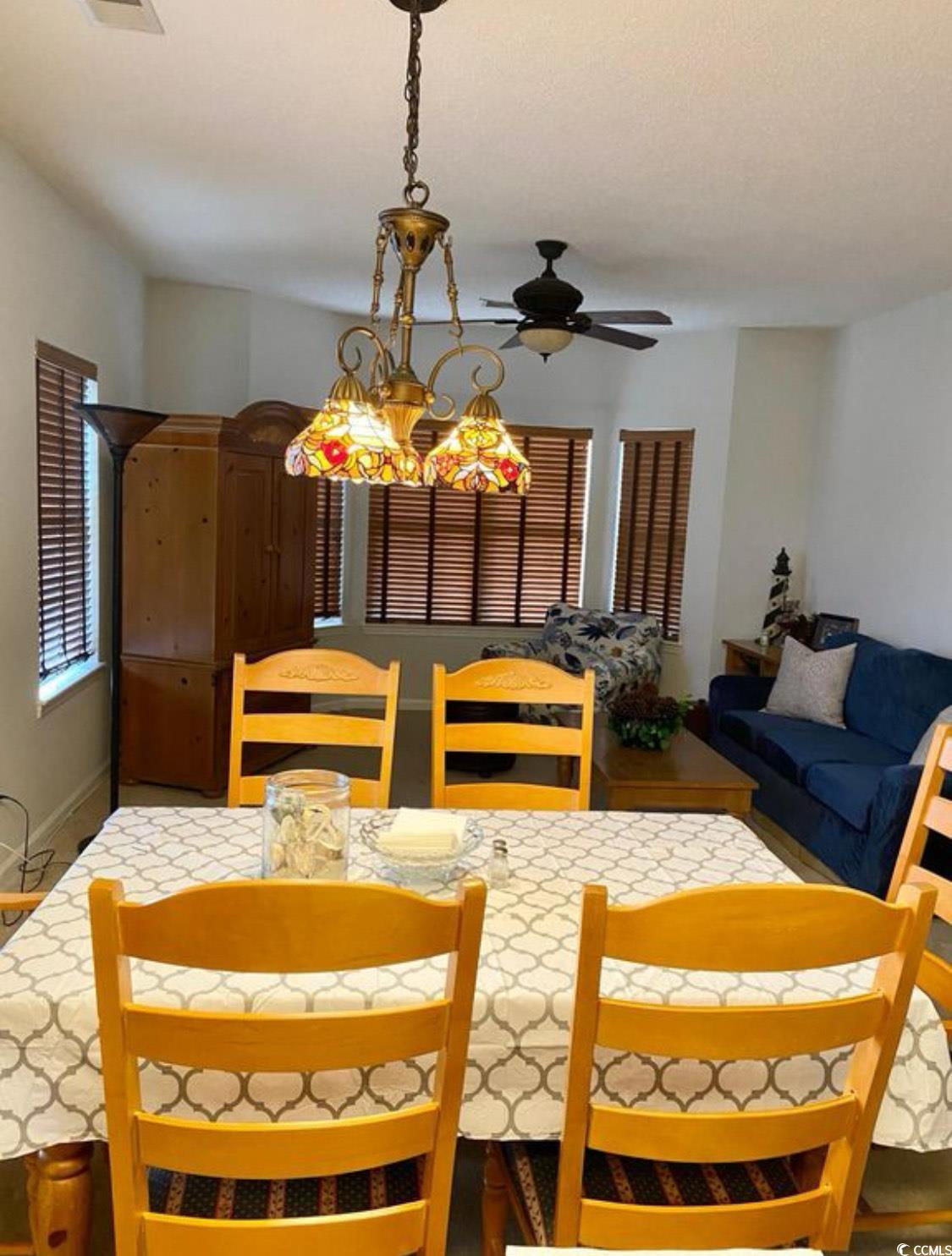 4603 Arran Court, Unit C Myrtle Beach, SC 29579 - Photo 5 of 34 Dining area with a ceiling fan