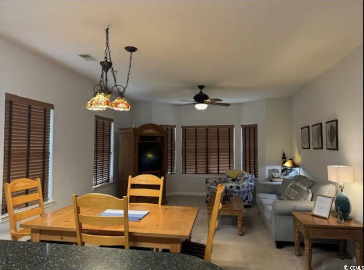 4603 Arran Court, Unit C Myrtle Beach, SC 29579 - Photo 6 of 34 Dining area featuring a ceiling fan
