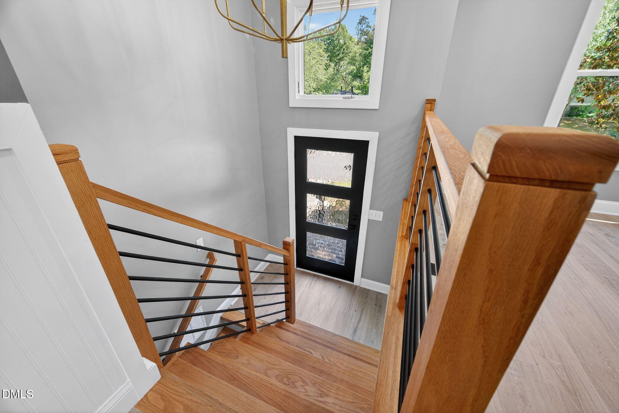 313 Crown Oaks Drive Raleigh, NC 27615 - Photo 5 of 60 a view of a stairs and an entryway