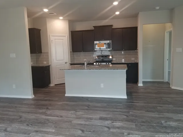 a house with trees in front of it