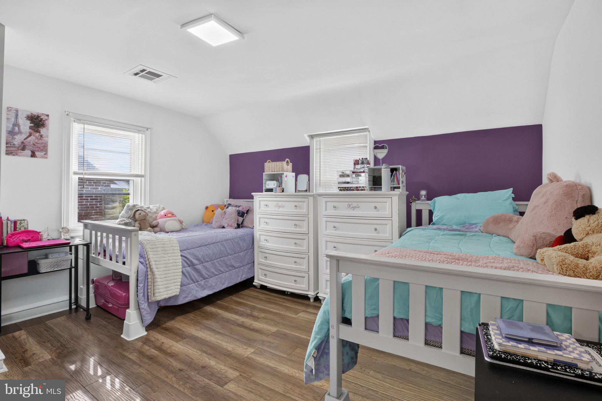 16 Underwood Road Wyncote, PA 19095 - Photo 28 of 40 Charming twin bedroom with vibrant accents.