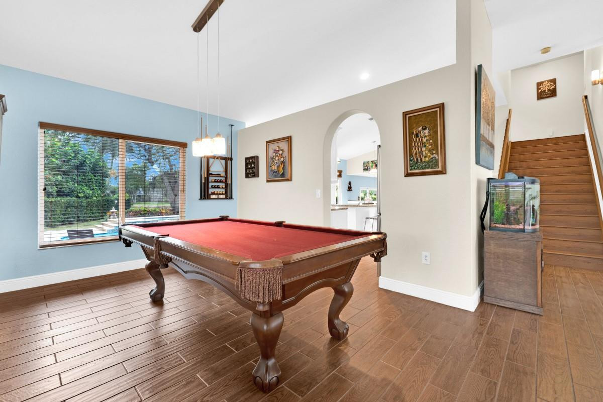 14809 Southwest 154th Court Miami, FL 33196 - Photo 13 of 30 a room with pool table and windows