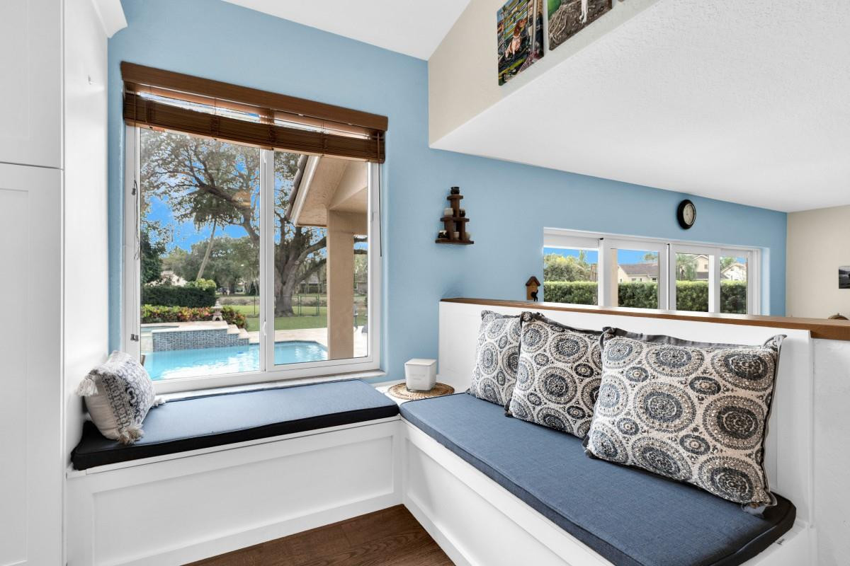 14809 Southwest 154th Court Miami, FL 33196 - Photo 10 of 30 a living room with furniture and a large window