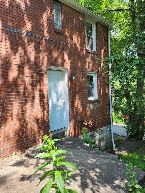 8624 Oakcrest Road Pittsburgh, PA 15235 - Photo 19 of 20 a front view of a house with a yard
