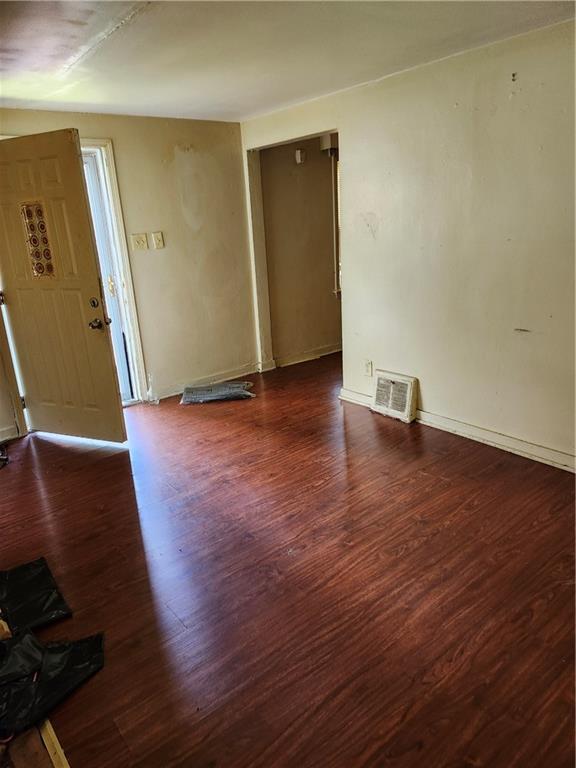 8624 Oakcrest Road Pittsburgh, PA 15235 - Photo 3 of 20 an empty room with wooden floor and entrance