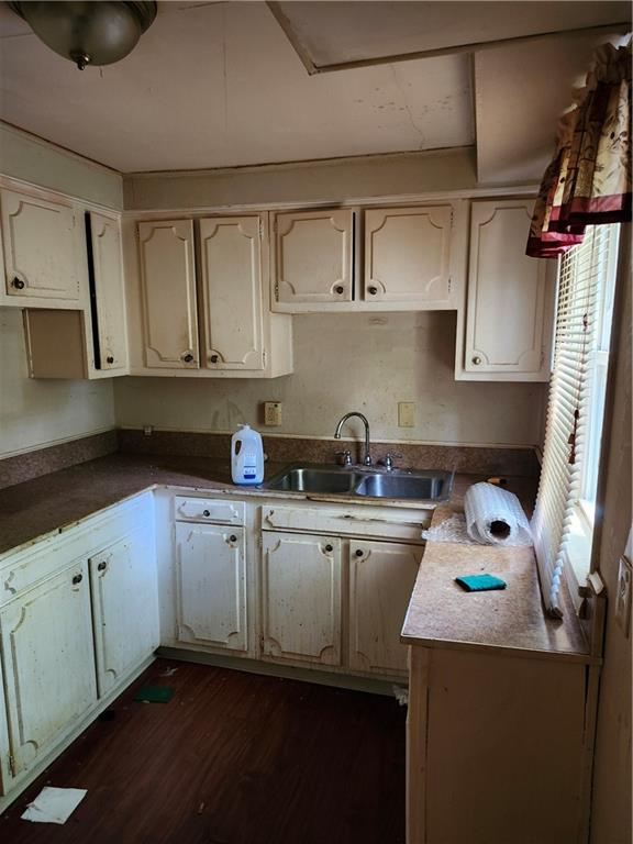 8624 Oakcrest Road Pittsburgh, PA 15235 - Photo 7 of 20 a kitchen with a sink a stove and cabinets