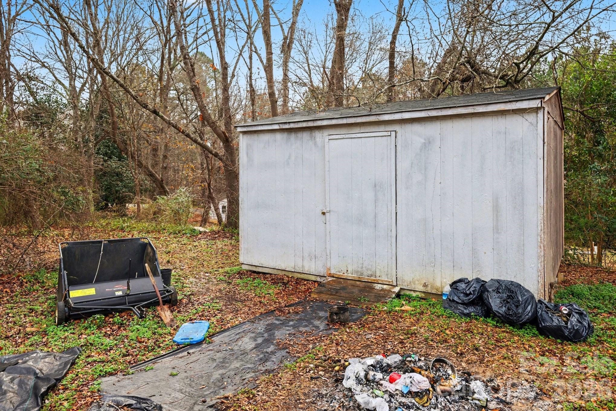 128 Paul Snipes Road Lancaster, SC 29720 - Photo 22 of 29 a backyard of a house with a table and chairs