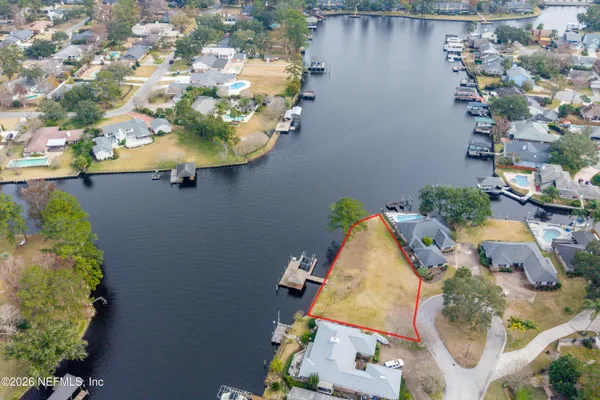 an aerial view of house with yard swimming pool and outdoor seating