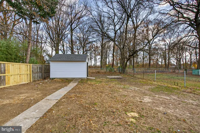a view of backyard with green space