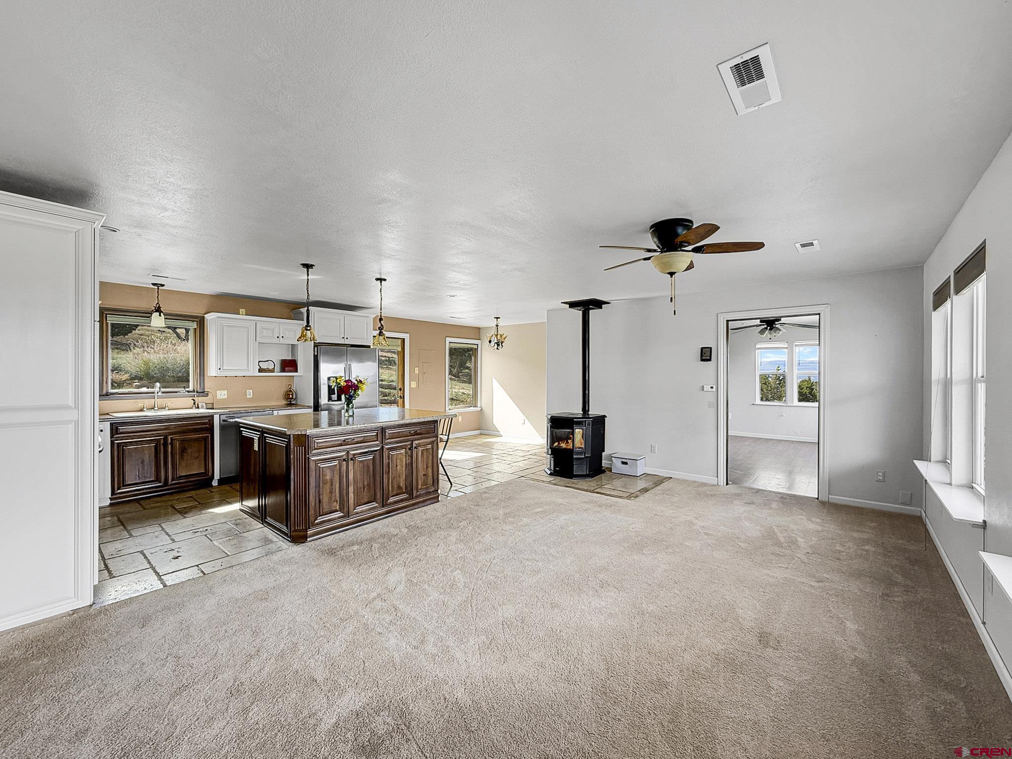 32310 B50 Road Crawford, CO 81415 - Photo 5 of 45 a view of a kitchen with furniture and a window