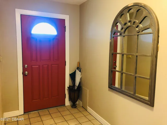 a view of a livingroom with a door