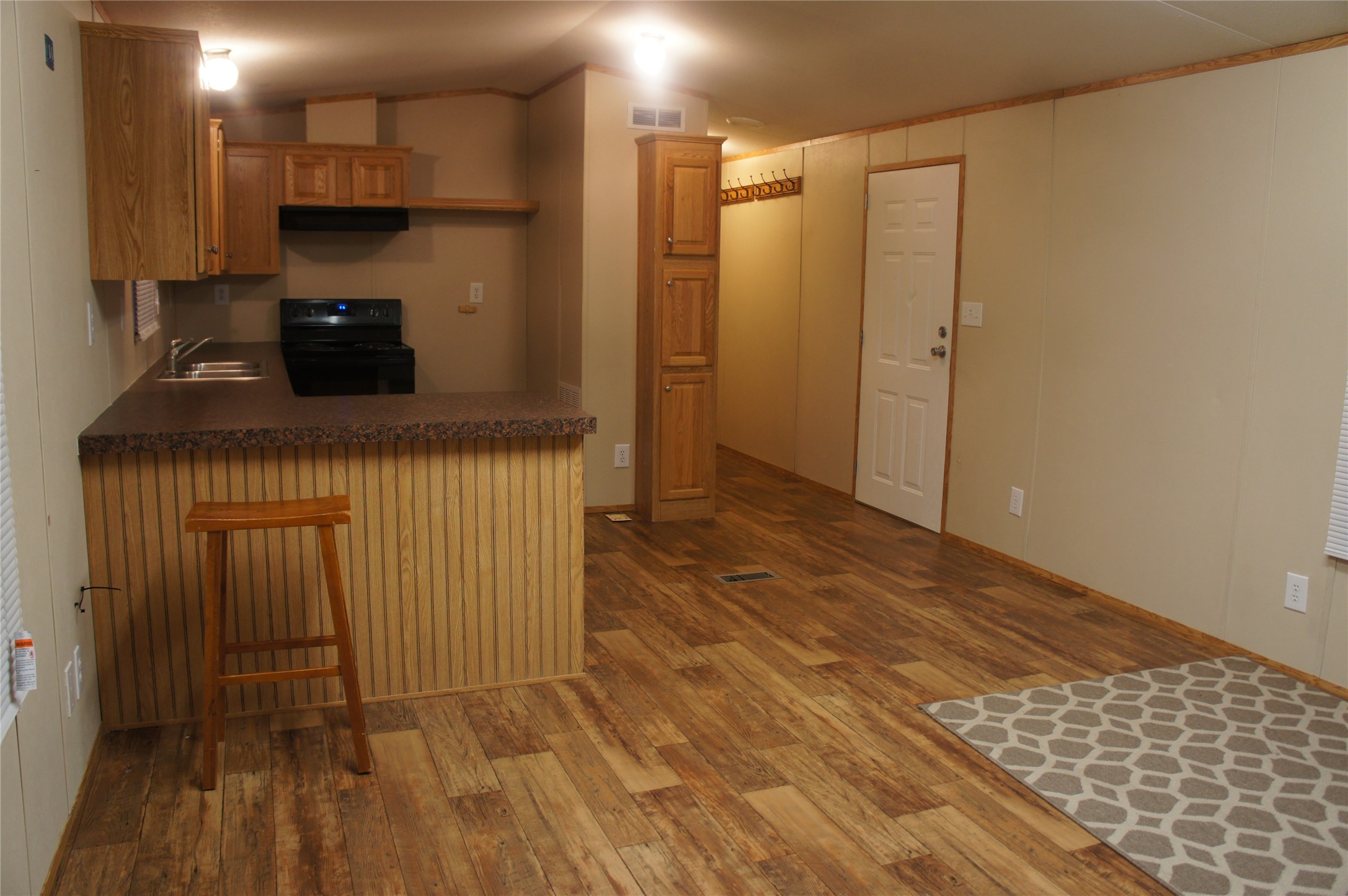 601 Clear Lake Road, Unit A Highlands, TX 77562 - Photo 12 of 17 a view of a kitchen from the hallway