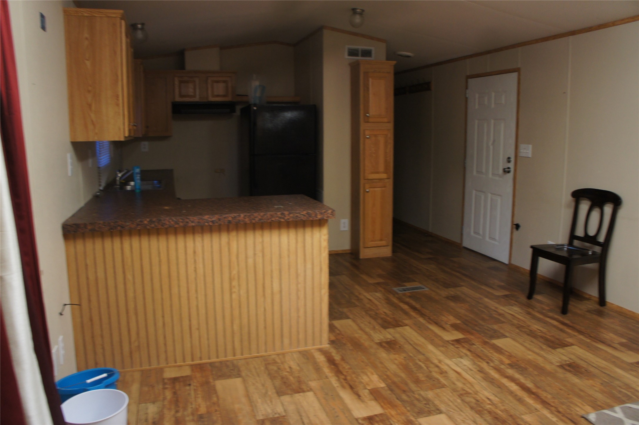 601 Clear Lake Road, Unit A Highlands, TX 77562 - Photo 5 of 17 a room with wooden floor and furniture