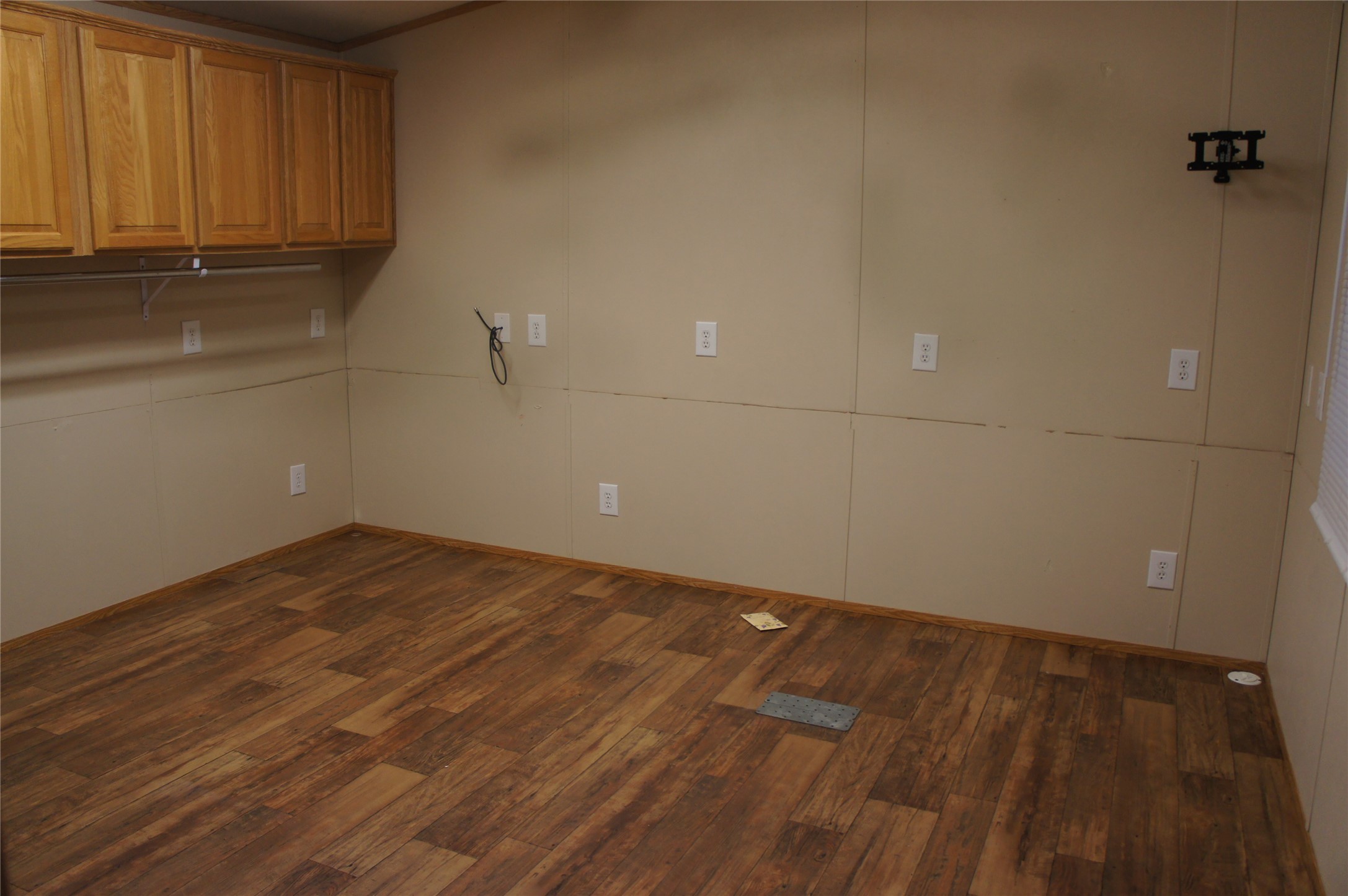 601 Clear Lake Road, Unit A Highlands, TX 77562 - Photo 10 of 17 a view of a room with wooden floor and cabinets