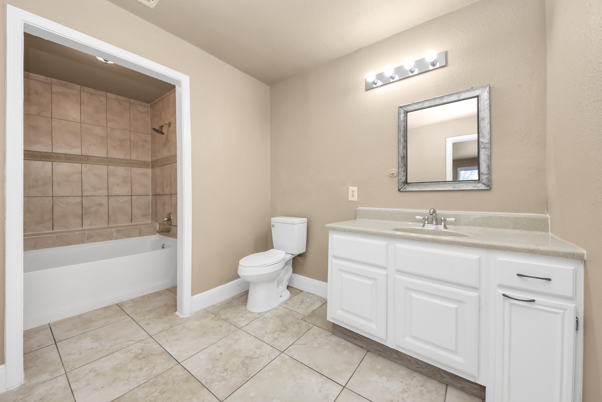 2510 Delaware Avenue League City, TX 77573 - Photo 21 of 38 a bathroom with a sink toilet and shower