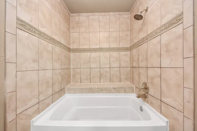 a bathroom with a bathtub