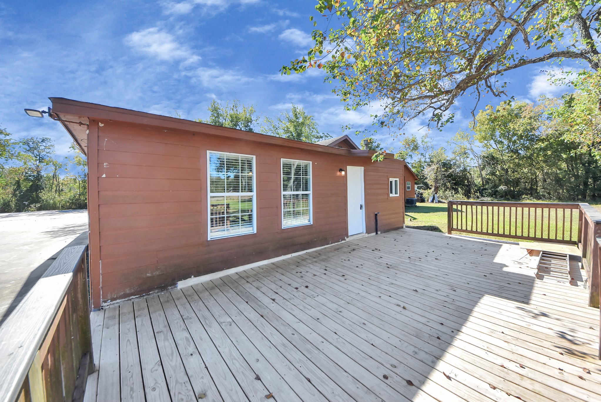 2510 Delaware Avenue League City, TX 77573 - Photo 34 of 38 a view of a house with a wooden deck
