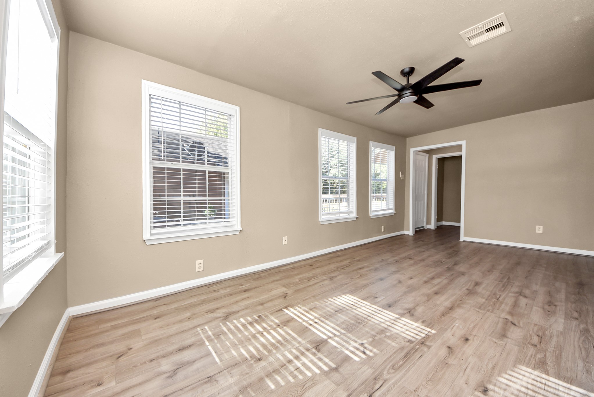 2510 Delaware Avenue League City, TX 77573 - Photo 6 of 38 a view of a livingroom with a ceiling fan and window