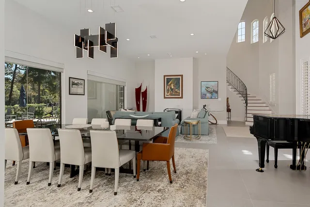 a view of a livingroom with furniture window and wooden floor