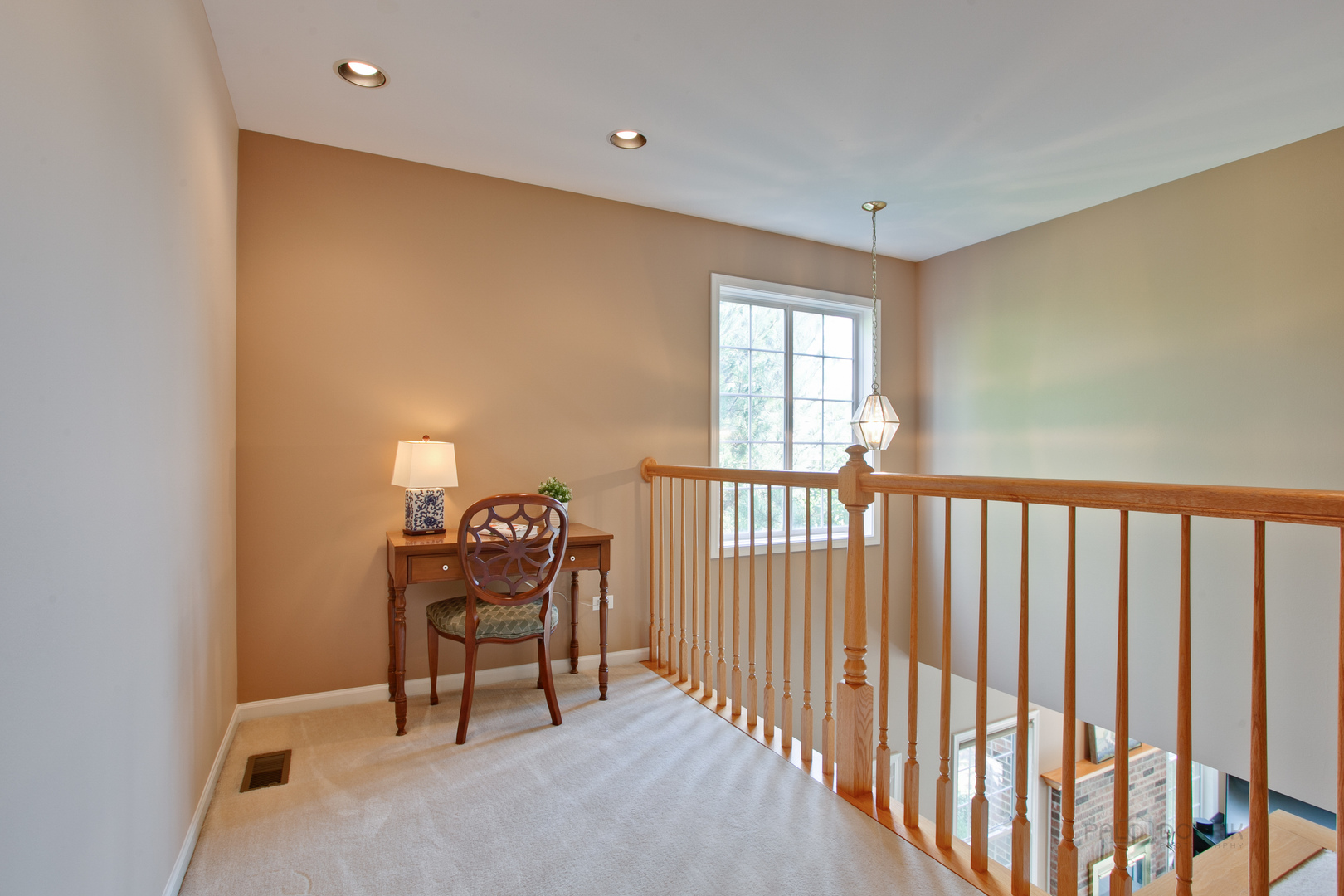 5451 McDonough Road Hoffman Estates, IL 60192 - Photo 22 of 30 a balcony with a table and chairs