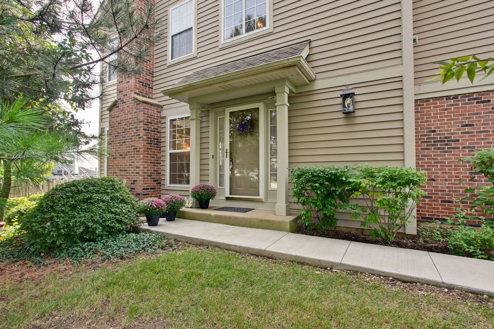 5451 McDonough Road Hoffman Estates, IL 60192 - Photo 26 of 30 a view of a house with backyard and sitting area