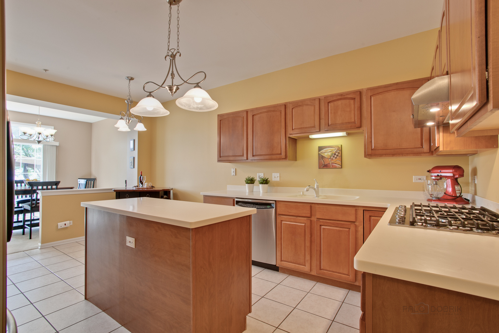 5451 McDonough Road Hoffman Estates, IL 60192 - Photo 8 of 30 a kitchen that has a sink and a stove in it