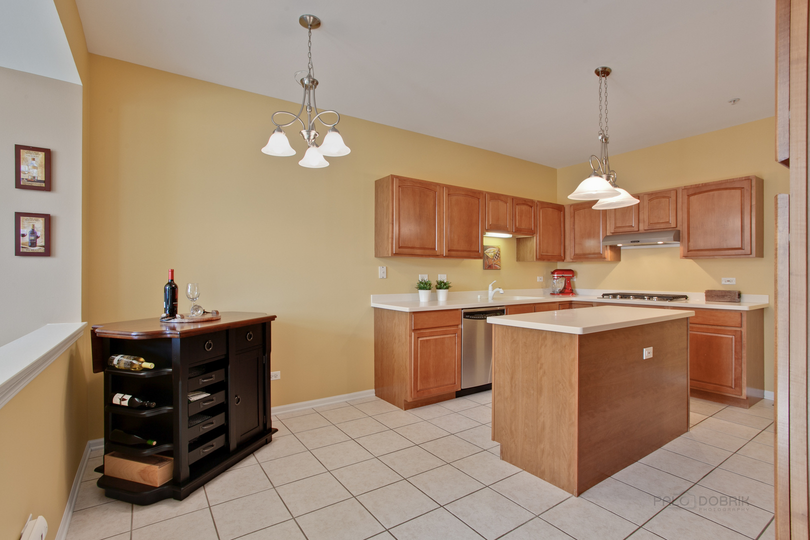 5451 McDonough Road Hoffman Estates, IL 60192 - Photo 9 of 30 a kitchen that has a lot of cabinets in it