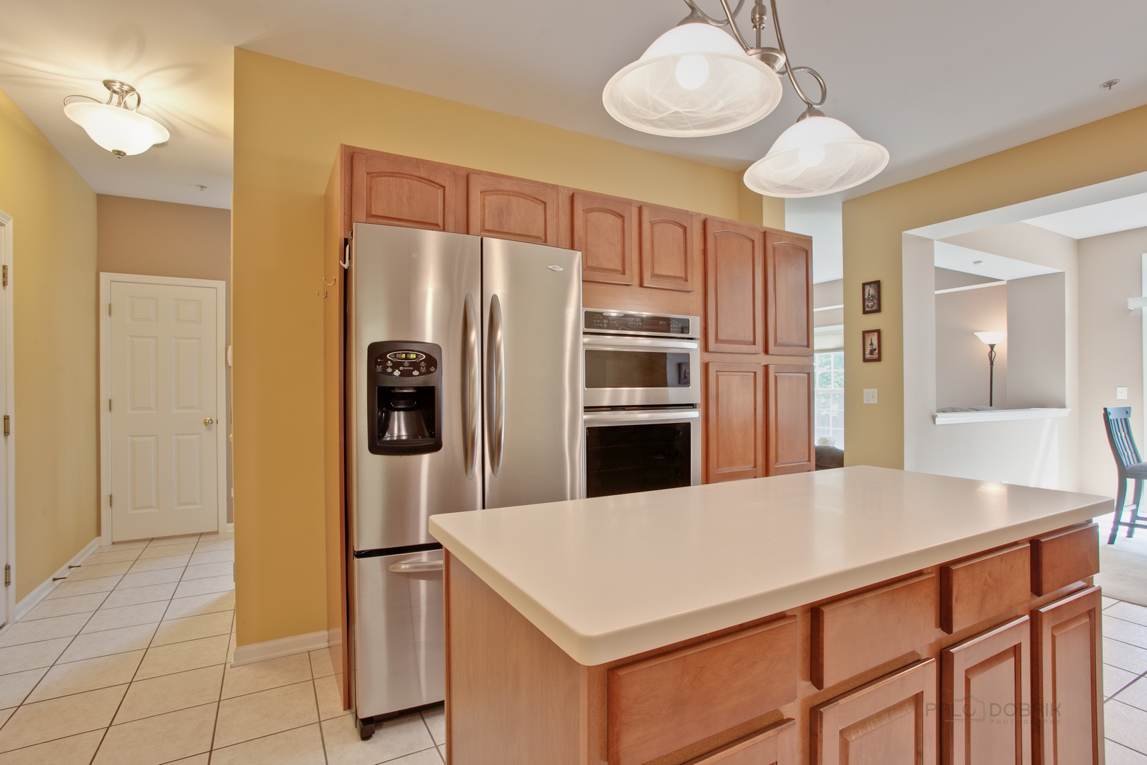 5451 McDonough Road Hoffman Estates, IL 60192 - Photo 10 of 30 a kitchen with stainless steel appliances a refrigerator and a stove
