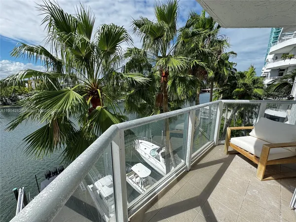 a view of balcony with furniture