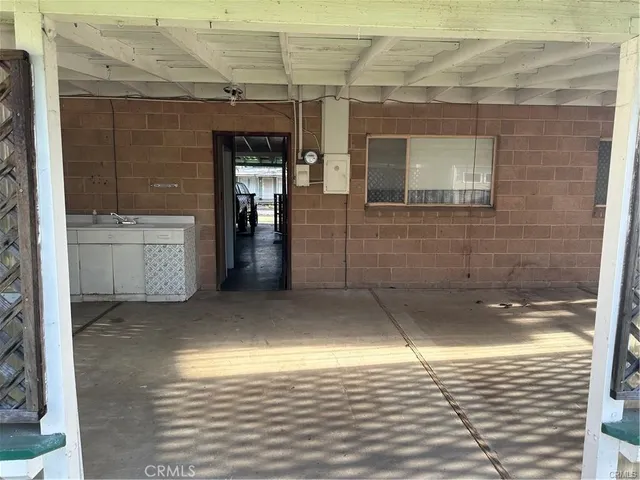 a view of empty room with a bathroom