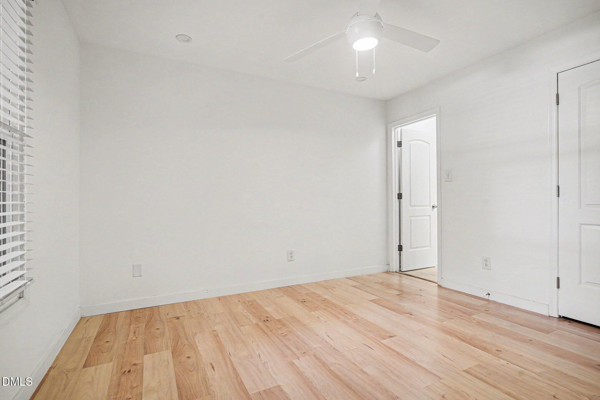 3555 Mill Run Raleigh, NC 27612 - Photo 10 of 25 a view of empty room with wooden floor