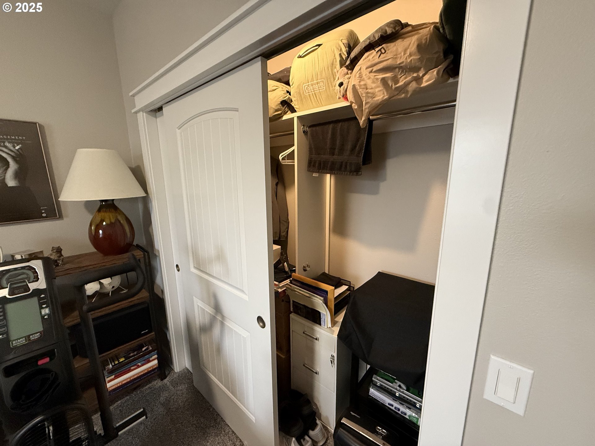 4055 Caddington Lane Florence, OR 97439 - Photo 18 of 48 a view of walk in closet with clothes and shoes
