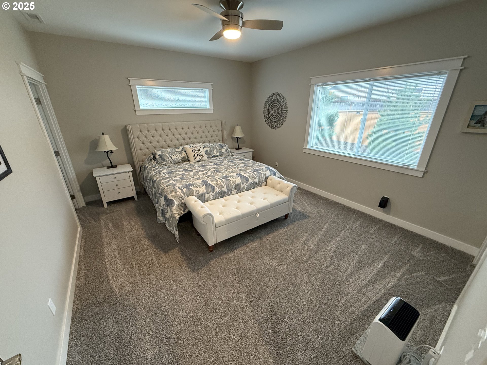 4055 Caddington Lane Florence, OR 97439 - Photo 26 of 48 a bedroom with a bed and a window