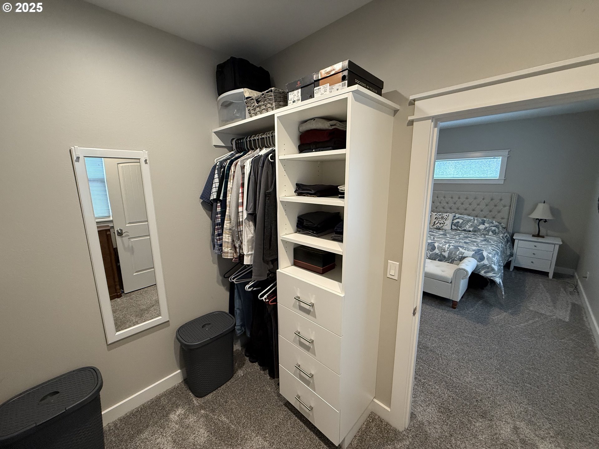 4055 Caddington Lane Florence, OR 97439 - Photo 29 of 48 a view of walk in closet with clothes and shoes