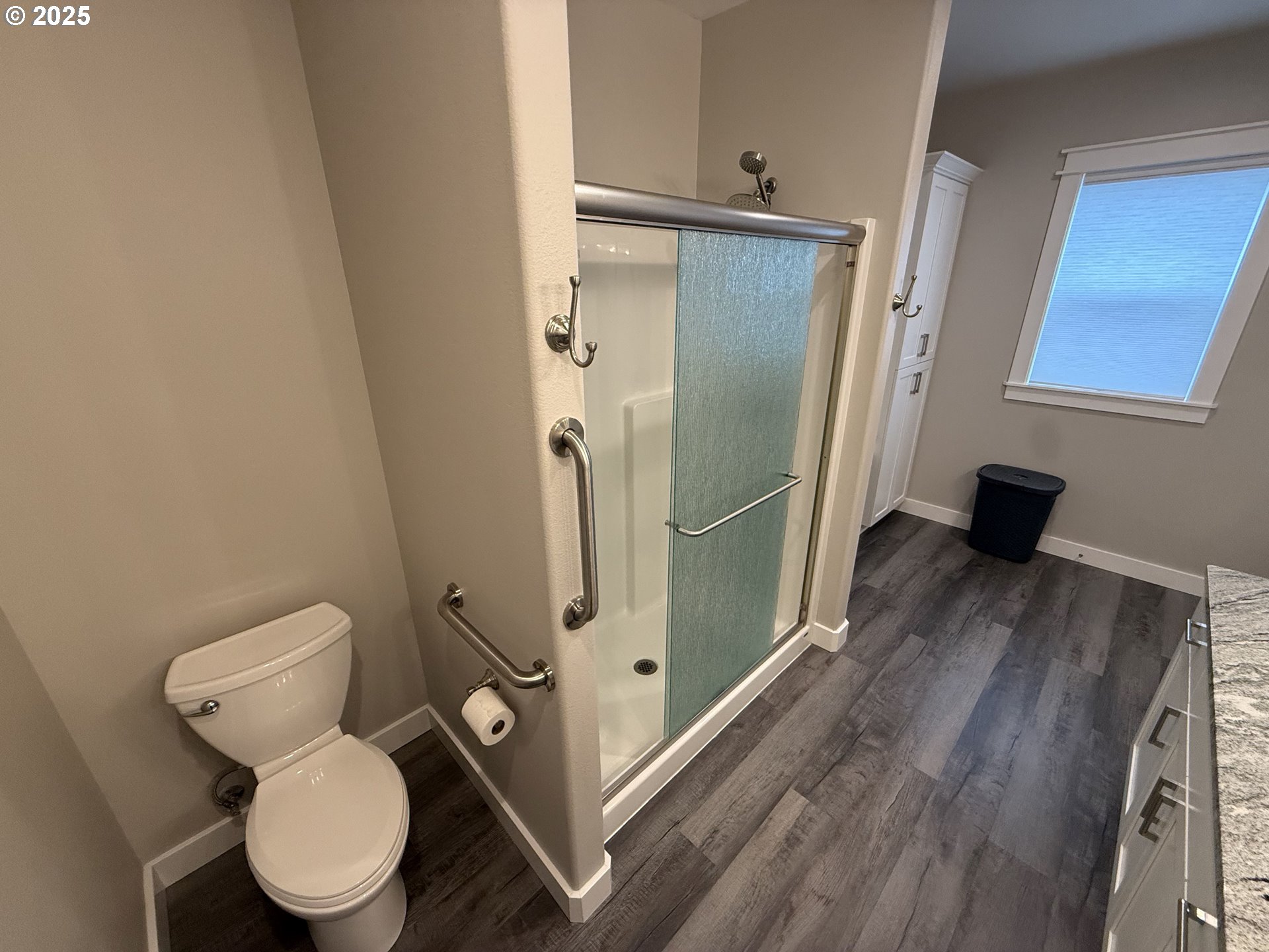 4055 Caddington Lane Florence, OR 97439 - Photo 33 of 48 a bathroom with a toilet and a shower