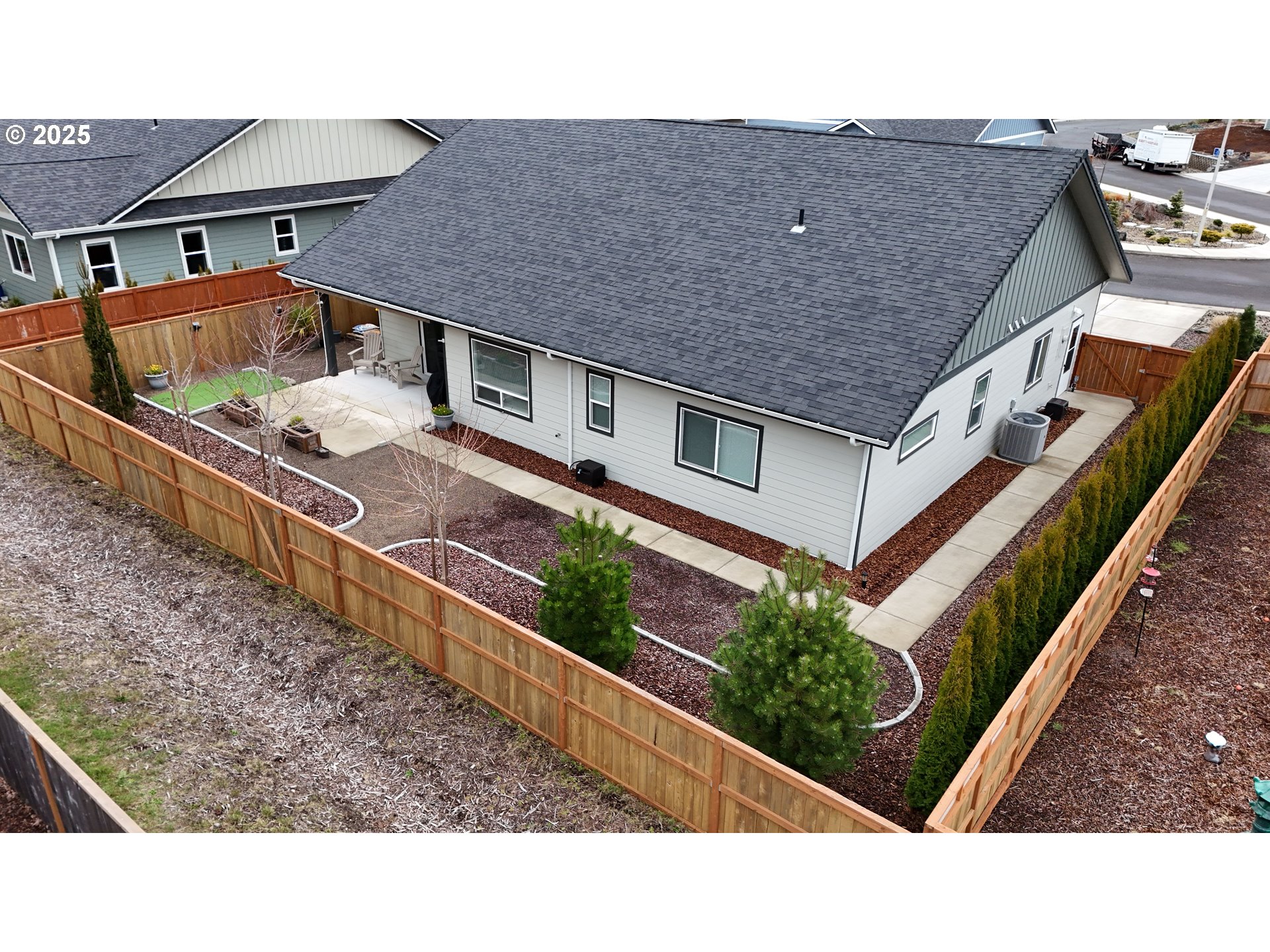 4055 Caddington Lane Florence, OR 97439 - Photo 40 of 48 a aerial view of a house with a yard