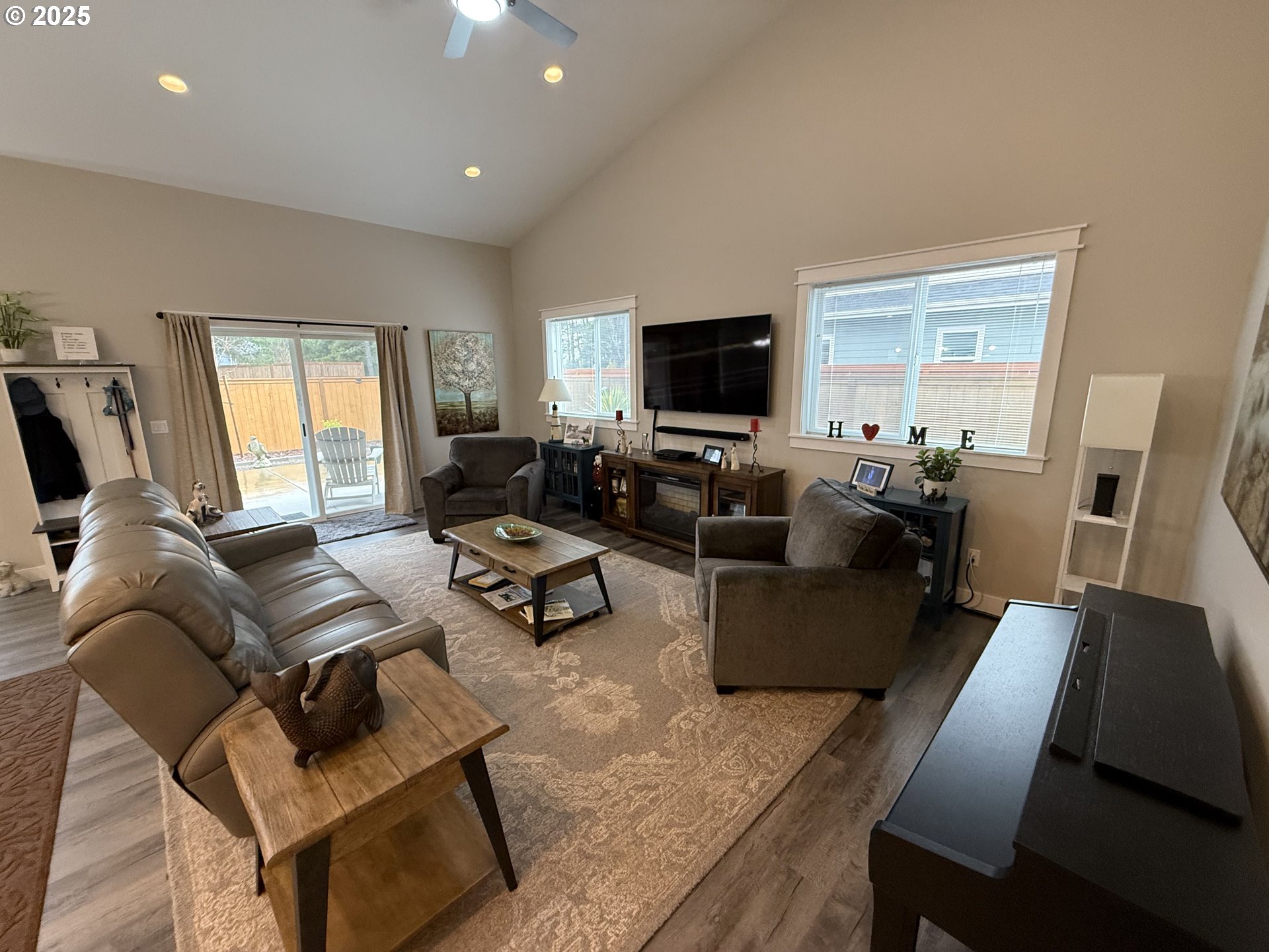 4055 Caddington Lane Florence, OR 97439 - Photo 8 of 48 a living room with furniture and a flat screen tv