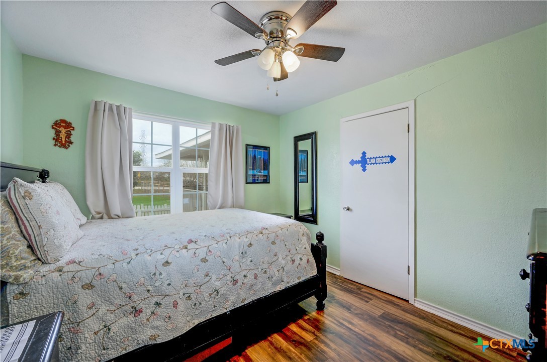 2283 Schwab Road Seguin, TX 78155 - Photo 16 of 40 a bedroom with a bed and a window