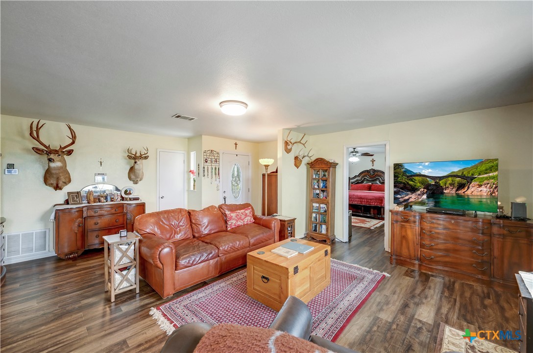 2283 Schwab Road Seguin, TX 78155 - Photo 6 of 40 a living room with furniture and a flat screen tv