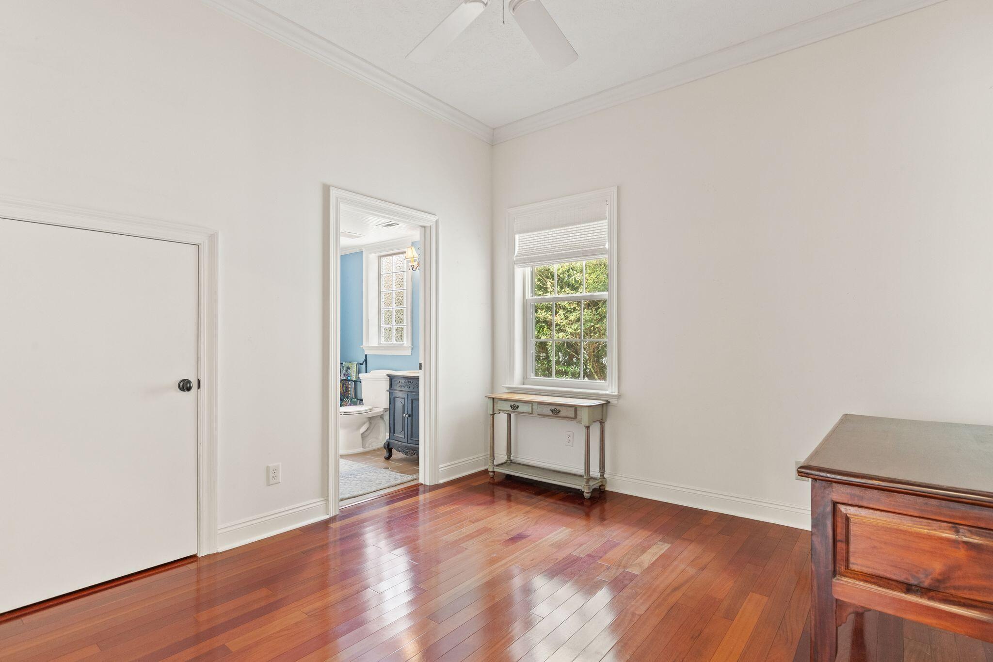 31 Seabreeze Place Inlet Beach, FL 32461 - Photo 11 of 67 an empty room with wooden floor and windows